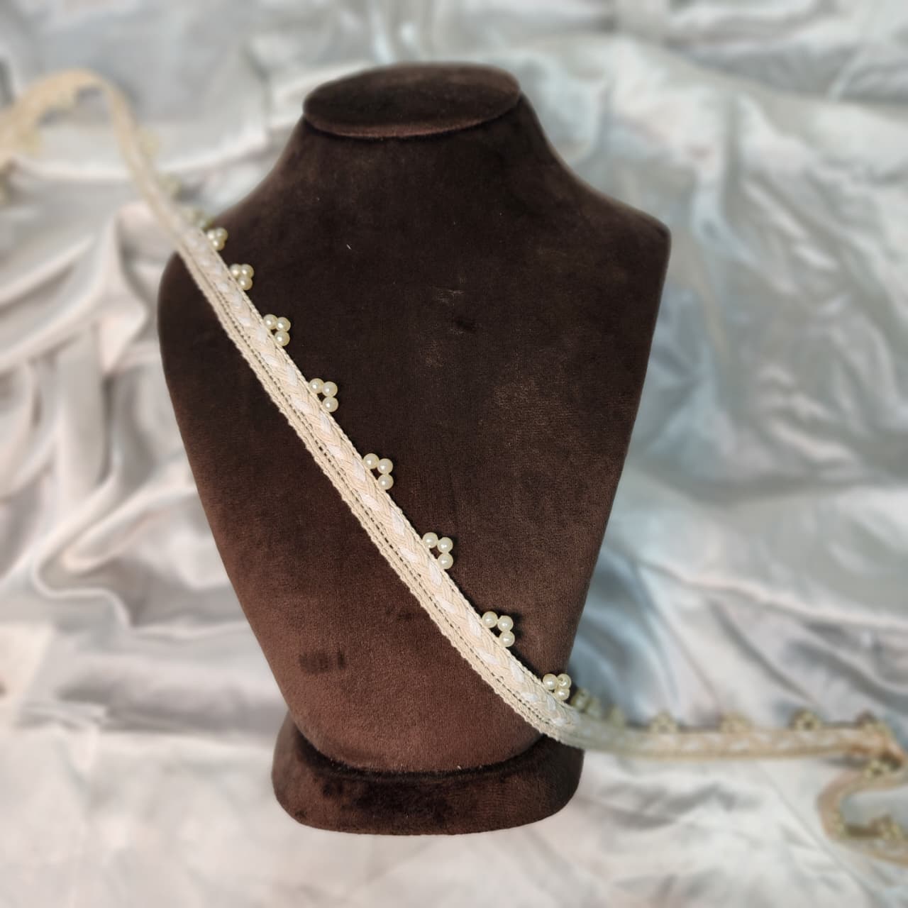 Elegant off-white lace with pearl work
