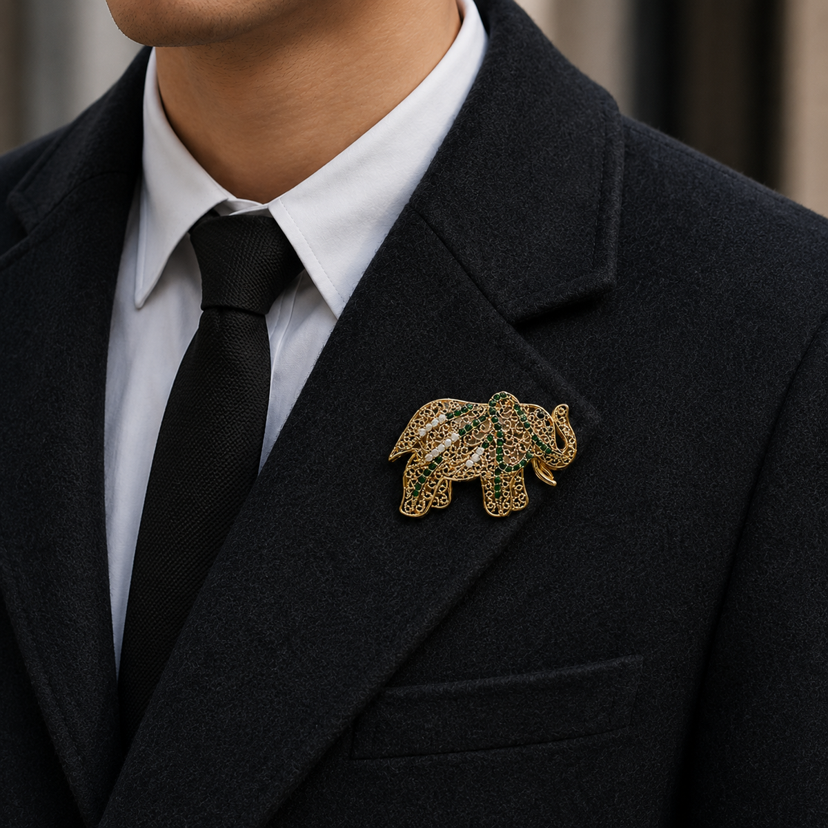 Gold Tone Elephant Brooch with Green & White Crystal Accents