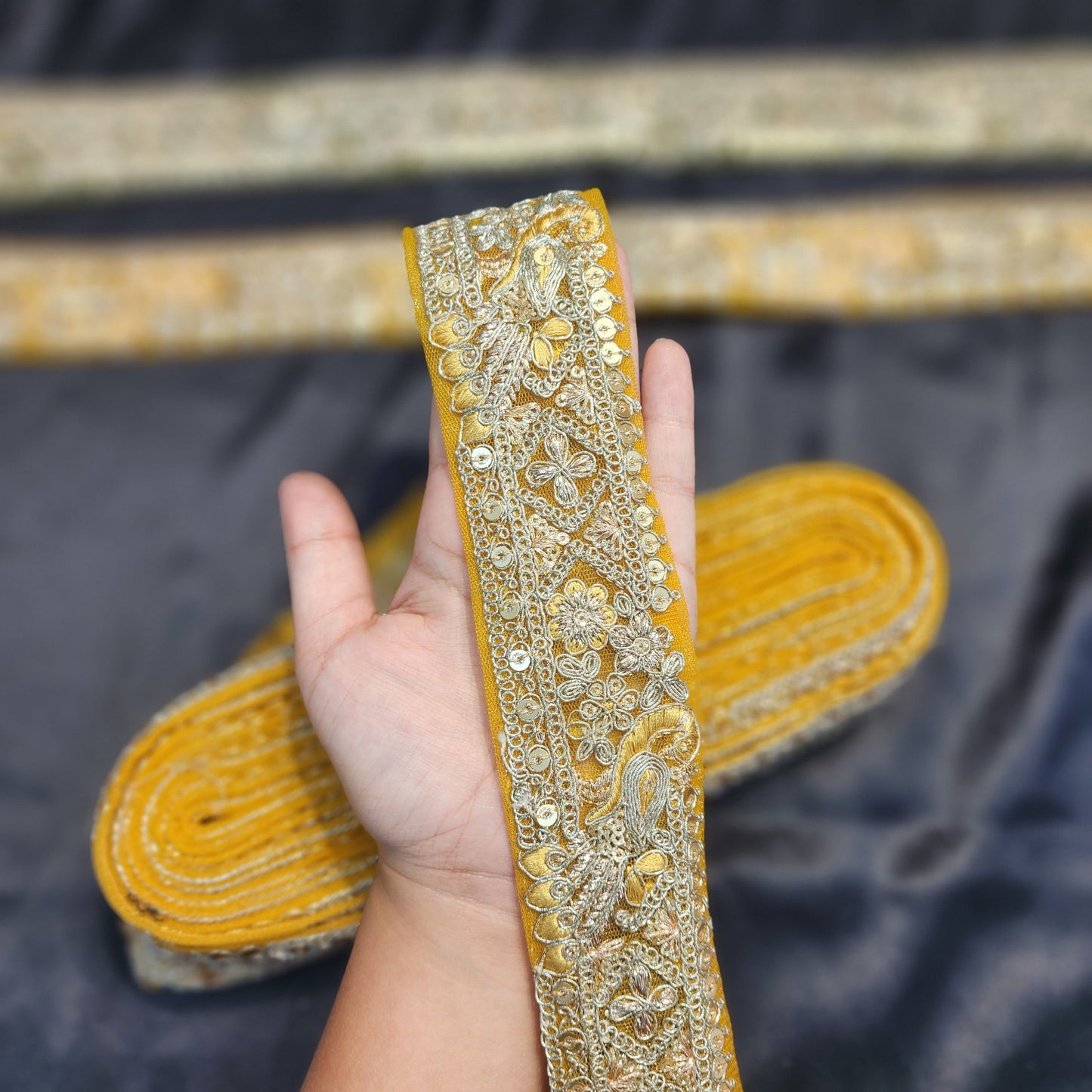 Yellow color Zari lace with peacock design