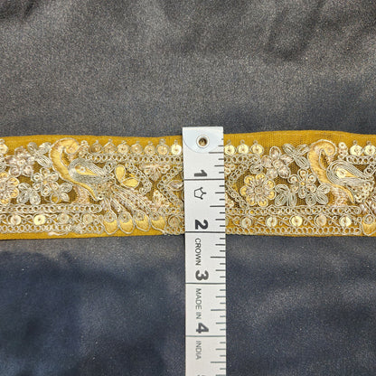 Yellow color Zari lace with peacock design