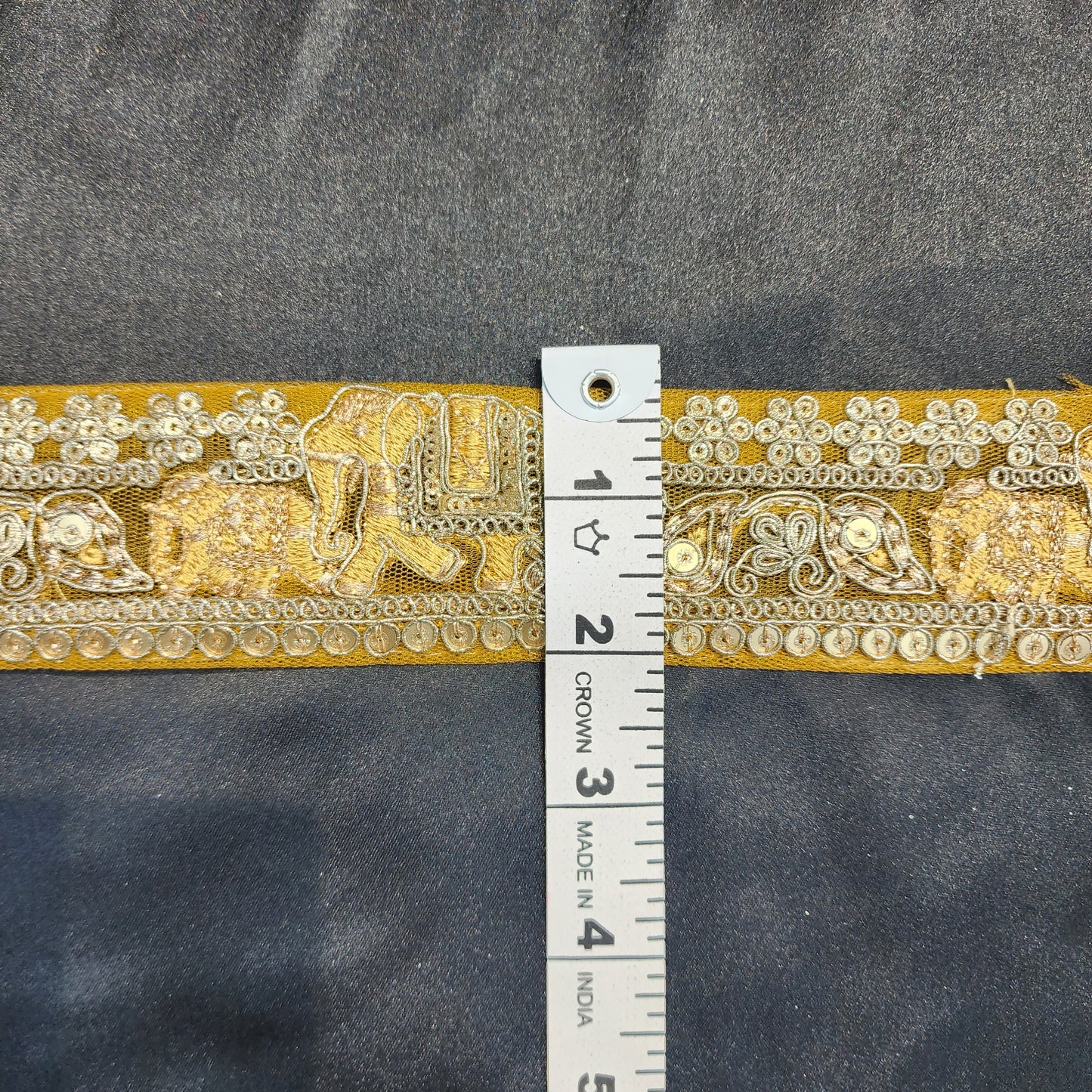 Yellow color Zari lace with net base