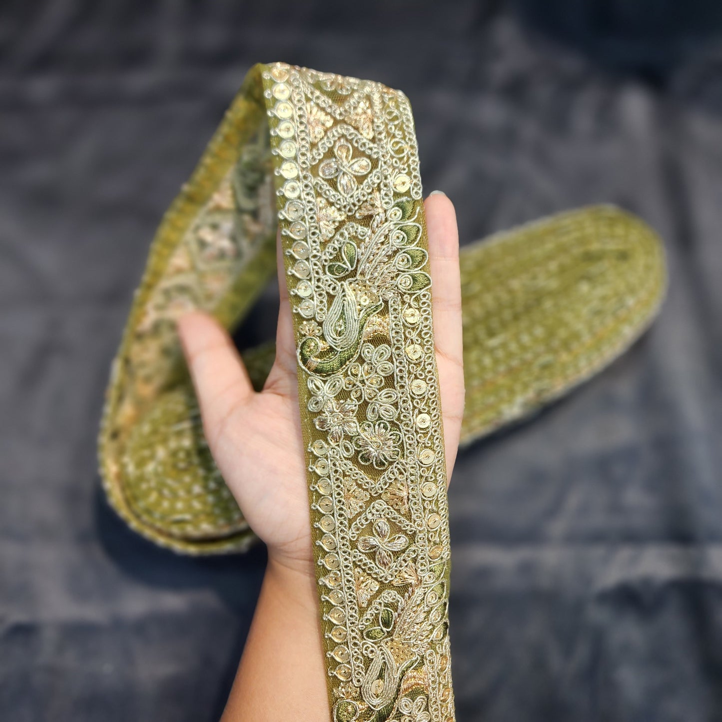 Green color Zari lace with peacock design